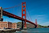 Golden Gate Bridge, viewed from Fort Point, with the Marin Headlands visible in the distance.  San Francisco. San Francisco, California, USA. Image #09052