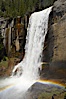 Vernal Falls at peak flow in late spring, with a rainbow appearing in the spray of the falls, viewed from the Mist Trail. Vernal Falls, Yosemite National Park, California, USA. Image #12634