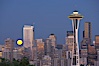 Full moon rises over Seattle city skyline at dusk, Space Needle at right. Seattle, Washington, USA. Image #13660