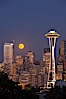 Full moon rises over Seattle city skyline, Space Needle at right. Seattle, Washington, USA. Image #13664