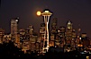 Full moon rises over Seattle city skyline, Space Needle at right. Seattle, Washington, USA. Image #13666
