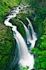 Sol Duc Falls.  Sol Duc Falls is one of the largest and most beautiful waterfalls in Olympic National Park, seen here from a bridge that crosses the canyon just below the falls. Surrounding the falls is an old-growth forest of hemlocks and douglas firs, some of which are three hundred years in age. Sol Duc Springs, Olympic National Park, Washington, USA. Image #13747