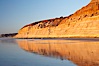Sandstone cliffs rise above the beach at Torrey Pines State Reserve. Torrey Pines State Reserve, San Diego, California, USA. Image #14726