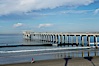 The Scripps Institution of Oceanography research pier is 1090 feet long and was built of reinforced concrete in 1988, replacing the original wooden pier built in 1915.  The Scripps Pier is home to a variety of sensing equipment above and below water that collects various oceanographic data.  The Scripps research diving facility is located at the foot of the pier.  Fresh seawater is pumped from the pier to the many tanks and facilities of SIO, including the Birch Aquarium.  The Scripps Pier is named in honor of Ellen Browning Scripps, the most significant donor and benefactor of the Institution. Scripps Institution of Oceanography, La Jolla, California, USA. Image #14749