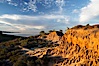 Broken Hill with La Jolla and the Pacific Ocean in the distance.  Broken Hill is an ancient, compacted sand dune that was uplifted to its present location and is now eroding. Torrey Pines State Reserve, San Diego, California, USA. Image #14753