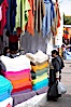 Otavalo market, a large and famous Andean market high in the Ecuadorian mountains, is crowded with locals and tourists each Saturday. San Pablo del Lago, Otavalo, Ecuador. Image #16795