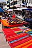 Otavalo market, a large and famous Andean market high in the Ecuadorian mountains, is crowded with locals and tourists each Saturday. San Pablo del Lago, Otavalo, Ecuador. Image #16798