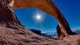 Wilson Arch rises high above route 191 in eastern Utah, with a span of 91 feet and a height of 46 feet. USA. Image #18031