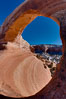 Wilson Arch rises high above route 191 in eastern Utah, with a span of 91 feet and a height of 46 feet. USA. Image #18032