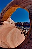 Wilson Arch rises high above route 191 in eastern Utah, with a span of 91 feet and a height of 46 feet. Wilson Arch, Utah, USA. Image #18032