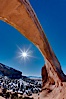 Wilson Arch rises high above route 191 in eastern Utah, with a span of 91 feet and a height of 46 feet. Wilson Arch, Utah, USA. Image #18033