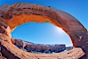 Wilson Arch rises high above route 191 in eastern Utah, with a span of 91 feet and a height of 46 feet. Wilson Arch, Utah, USA. Image #18034