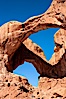 Double Arch, an amazing pair of natural arches formed in the red Entrada sandstone of Arches National Park. Double Arch, Arches National Park, Utah, Utah, USA. Image #18177