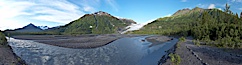 Panorama of Exit Creek, early morning, summer, as it washes over the flood plain below Exit Glacier. Exit Glacier, Kenai Fjords National Park, Alaska, USA. Image #19109