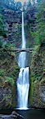 Multnomah Falls.  Plummeting 620 feet from its origins on Larch Mountain, Multnomah Falls is the second highest year-round waterfall in the United States.  Nearly two million visitors a year come to see this ancient waterfall making it Oregon's number one public destination. Multnomah Falls, Columbia River Gorge National Scenic Area, Oregon, USA. Image #19313