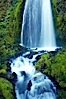 Wahkeena Falls drops 249 feet in several sections through a lush green temperate rainforest. Wahkeena Falls, Columbia River Gorge National Scenic Area, Oregon, USA. Image #19324