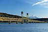 The Hood River Bridge is a truss bridge with a vertical lift that spans the Columbia River between Hood River, Oregon and White Salmon, Washington.  The bridge is currently the second oldest road bridge across the Columbia between Washington and Oregon. It was built by the Oregon-Washington Bridge Company and opened on December 9, 1924. The original name was the Waucoma Interstate Bridge. Columbia River, Hood River, Oregon, USA. Image #19369
