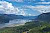 The Columbia River stretches to the east, viewed from the Vista House overlook high above the Oregon (south) side of the river. Vista House, Columbia River Gorge National Scenic Area, Oregon, USA. Image #19373