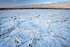 Devils Golf Course. Evaporated salt has formed into gnarled, complex crystalline shapes on the salt pan of Death Valley National Park, one of the largest salt pans in the world.  The shapes are constantly evolving as occasional floods submerge the salt concretions before receding and depositing more salt. Devils Golf Course, Death Valley National Park, California, USA. Image #20551