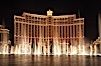 The Bellagio Hotel fountains, at night.  The Bellagio Hotel fountains are one of the most popular attractions in Las Vegas, showing every half hour or so throughout the day, choreographed to famous Hollywood music. Las Vegas, Nevada, USA. Image #20557