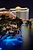 Jasmine Restaurant and Caesar's Palace Hotel are reflected in the Bellagio Hotel fountain pool at night. Las Vegas, Nevada, USA. Image #20561