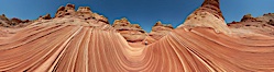Panorama of the Wave.  The Wave is a sweeping, dramatic display of eroded sandstone, forged by eons of water and wind erosion, laying bare striations formed from compacted sand dunes over millenia.  This panoramic picture is formed from thirteen individual photographs. North Coyote Buttes, Paria Canyon-Vermilion Cliffs Wilderness, Arizona, USA. Image #20702