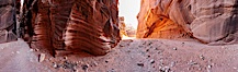 Wire Pass narrows opens into the Buckskin Gulch.  These narrow slot canyons are formed by water erosion which cuts slots deep into the surrounding sandstone plateau.  This is a panorama created from ten individual photographs. Wire Pass, Paria Canyon-Vermilion Cliffs Wilderness, Arizona, USA. Image #20705