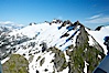 Mariner Mountain, viewed from the northwest, on the west coast of Vancouver Island, British Columbia, Canada, part of Strathcona Provincial Park, located 36 km (22 mi) north of Tofino.  It is 1,771 m (5,810 ft) high, snow covered year-round and home to several glaciers. Mariner Mountain, Strathcona Provincial Park, British Columbia, Canada. Image #21085