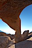 Mobius Arch in golden early morning light.  The natural stone arch is found in the scenic Alabama Hlls near Lone Pine, California. Alabama Hills Recreational Area, California, USA. Image #21738