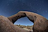 Mobius Arch in the Alabama Hills, seen here at night with swirling star trails formed in the sky above due to a long time exposure. Alabama Hills Recreational Area, California, USA. Image #21772