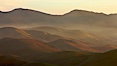 Hills between Morro Bay and Atascadero, early morning light, power transmission lines and signal attenae. Morro Bay, California, USA. Image #22220