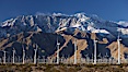 Wind turbines and Mount San Jacinto, rise above the flat floor of the San Gorgonio Pass near Palm Springs, provide electricity to Palm Springs and the Coachella Valley. San Gorgonio Pass, Palm Springs, California, USA. Image #22240