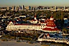 Hotel del Coronado, known affectionately as the Hotel Del.  It was once the largest hotel in the world, and is one of the few remaining wooden Victorian beach resorts.  It sits on the beach on Coronado Island, seen here with downtown San Diego in the distance.  It is widely considered to be one of Americas most beautiful and classic hotels. Built in 1888, it was designated a National Historic Landmark in 1977. San Diego, California, USA. Image #22287