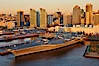 Downtown San Diego and USS Midway.  The USS Midway was a US Navy aircraft carrier, launched in 1945 and active through the Vietnam War and Operation Desert Storm, as of 2008 a museum along the downtown waterfront in San Diego. San Diego, California, USA. Image #22289