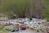 Pollution accumulates in the Tijuana River Valley following winter storms which flush the trash from Tijuana in Mexico across the border into the United States. Imperial Beach, San Diego, California, USA. Image #22544