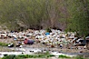Pollution accumulates in the Tijuana River Valley following winter storms which flush the trash from Tijuana in Mexico across the border into the United States. Imperial Beach, San Diego, California, USA. Image #22548