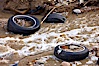 Pollution accumulates in the Tijuana River Valley following winter storms which flush the trash from Tijuana in Mexico across the border into the United States. Imperial Beach, San Diego, California, USA. Image #22553