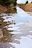 Pollution accumulates in the Tijuana River Valley following winter storms which flush the trash from Tijuana in Mexico across the border into the United States. Imperial Beach, San Diego, California, USA. Image #22554
