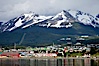 Ushuaia, the southernmost city in the world, lies on the Beagle Channel with a small portion of the Andes mountain range rising above.  Ushuaia is the capital of the Tierra del Fuego region of Argentina and the gateway port for many expeditions to Antarctica. Ushuaia, Tierra del Fuego, Argentina. Image #23602