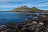 Northeastern coast of Steeple Jason Island, looking toward the southern half of the island.  Steeple Jason is one of the remote Jason Group of Islands in the West Falklands.  Uninhabited, the island is spectacular both for its rugged scenery and its enormous breeding colony of black-browed albatross.  Steeple Jason Island is now owned and administered by the Wildlife Conservation Society. Steeple Jason Island, Falkland Islands, United Kingdom. Image #24101