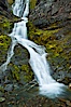 Shackleton Falls, named for explorer Sir Ernest Shackleton, formed from glacial meltwaters, near Stromness Bay. Stromness Harbour, South Georgia Island. Image #24588