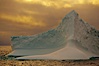 Iceberg, ocean, light and clouds.  Light plays over icebergs and the ocean near Coronation Island. Coronation Island, South Orkney Islands, Southern Ocean. Image #24780