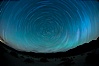 Star trails, rotating around the North Star (Polaris), seen from Death Valley. Milky Way Galaxy, The Universe. Image #25270