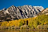 Sierra Nevada mountains and aspen trees, fall colors reflected in the still waters of North Lake. Bishop Creek Canyon Sierra Nevada Mountains, Bishop, California, USA. Image #26062