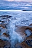 Waves wash over sandstone reef, clouds and sky. La Jolla, California, USA. Image #26335
