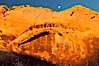 Setting moon over natural sandstone arch, sunrise. Valley of Fire State Park, Nevada, USA. Image #26481