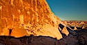 Rising sun creates the photographers shadow on a sandstone wall. Valley of Fire State Park, Nevada, USA. Image #26505