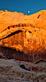 Setting moon over natural sandstone arch, sunrise. Valley of Fire State Park, Nevada, USA. Image #26506