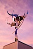 Flama de la Amistad, a statue by Leonardo Nierman.  Installed in the San Diego Convention Center�s outdoor amphitheater, Flame of Friendship is a polished, stainless-steel statue set against San Diego Bay weighing 3,700 pounds and standing 20 feet tall and eight feet wide. San Diego, California, USA. Image #26555