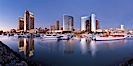 Panoramic photo of San Diego embarcadero, showing the San Diego Marriott Hotel and Marina (center), Roy's Restaurant (center) and Manchester Grand Hyatt Hotel (left) viewed from the San Diego Embarcadero Marine Park. San Diego, California, USA. Image #26568